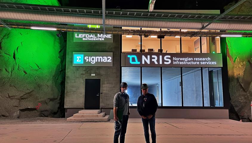 Einar Lillebrygfjeld og Helge Stranden stands in front of our building inside Lefdal Mine Datacenter.