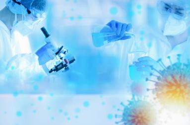 Rearchers working in a lab with abstract covid-19 virus surrounding them. 