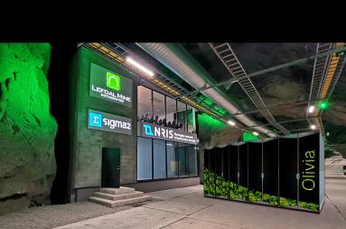 Illustration of the Sigma2 data hall in Lefdal Mine Datacenter with the supercomputer Olivia in the hall outside. 