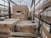 Cardboard boxes inside a trailer. 